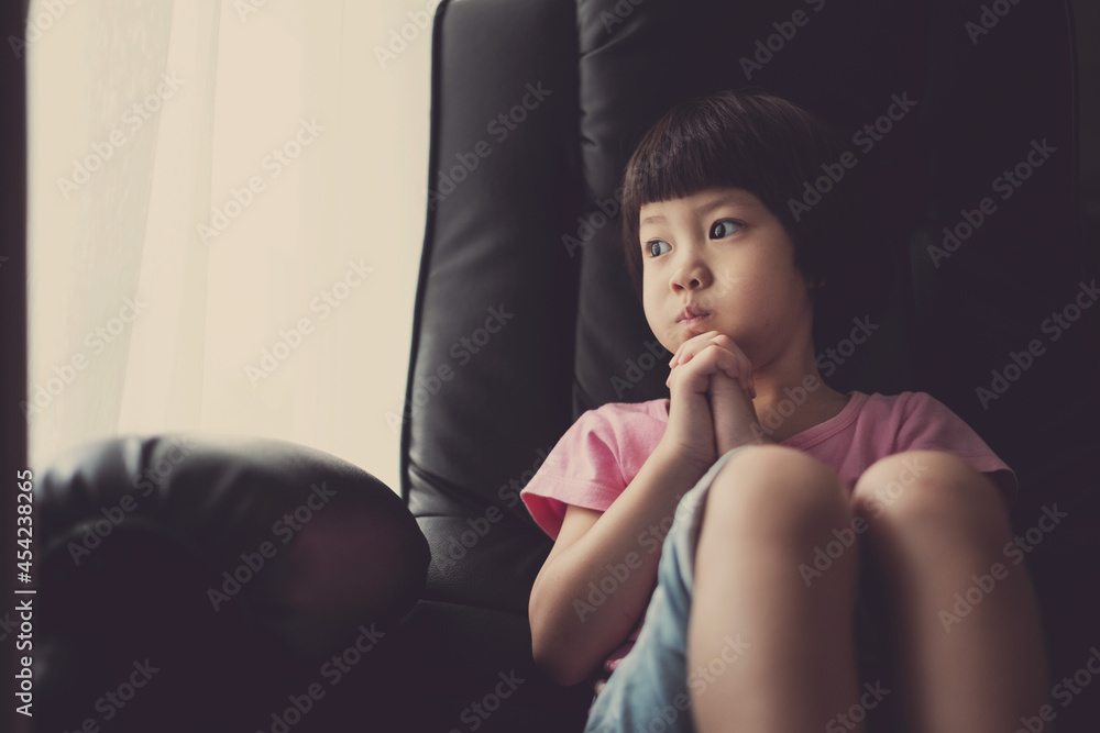 kid is praying, hands folded in prayer
kid is praying, hands folded in prayer