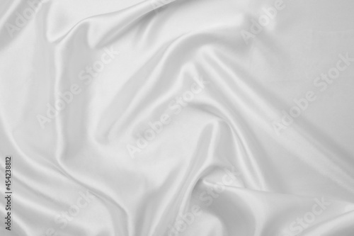White cloth background abstract with soft waves, closeup texture of cloth 