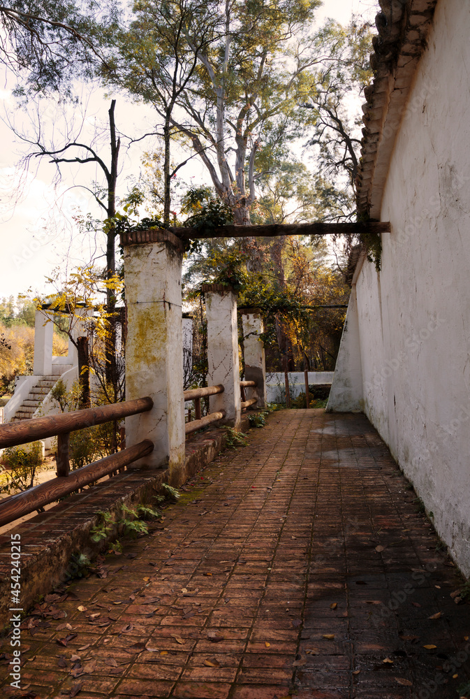 Evocative autumnal scene of a weathered old porch Evocative autumnal scene of a weathered old porch