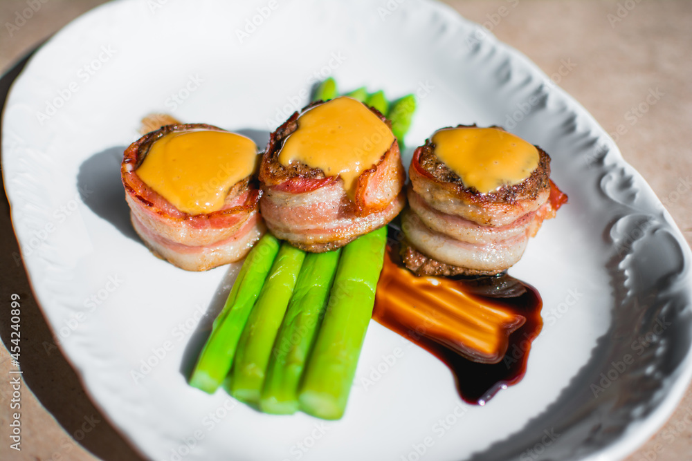 Grilled meat rolls from beef meat with mozzarella, ham, asparagus and potatoes
Grilled meat rolls from beef meat with mozzarella, ham, asparagus and potatoes