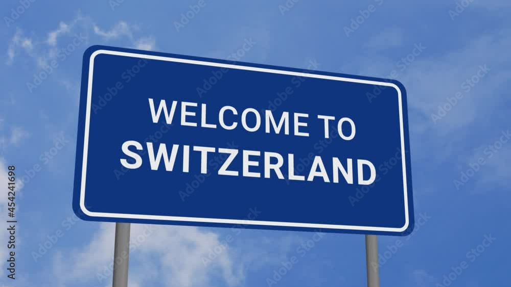 Welcome to Switzerland Road Sign on Clear Blue Sky with Rapid Moving Clouds Welcome to Switzerland Road Sign on Clear Blue Sky with Rapid Moving Clouds
