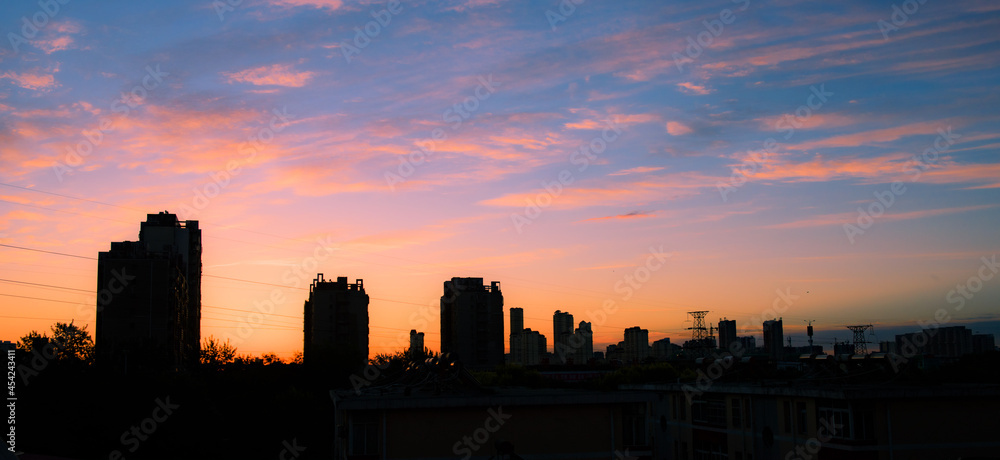 A beautiful view of the city skyline in the early morning, just before sunrise