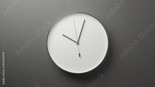 From 10 to 11 Clock Face on Grey Wall photo