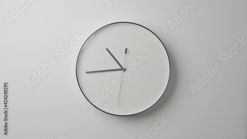 Clock Face on White Office Wall in Timelapse