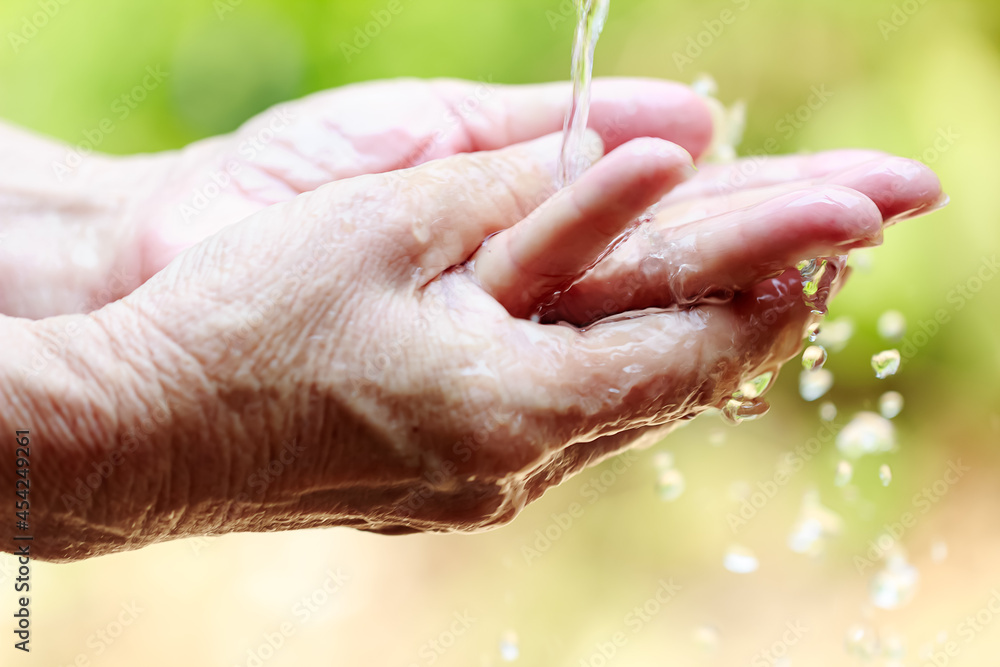 Fototapeta premium Woman washing hands