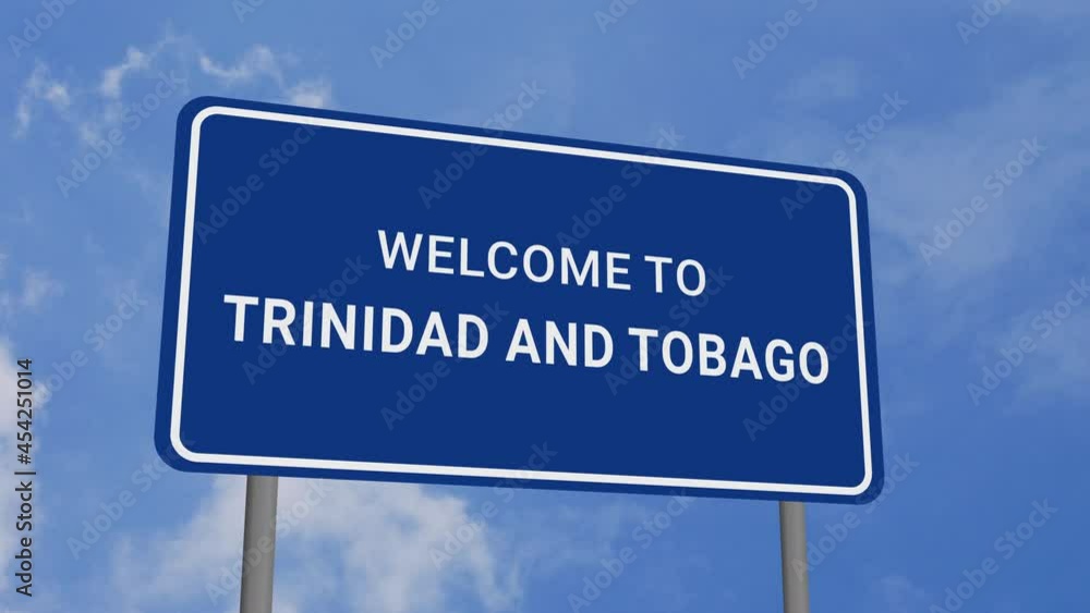 Welcome to Trinidad and Tobago Road Sign on Clear Blue Sky with Rapid Moving Clouds Welcome to Trinidad and Tobago Road Sign on Clear Blue Sky with Rapid Moving Clouds