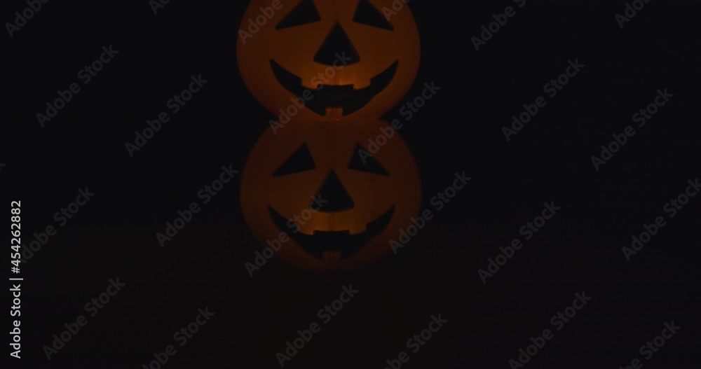 lit Halloween Pumpkin head trick or treat buckets Stacked lit Halloween Pumpkin head trick or treat buckets Stacked