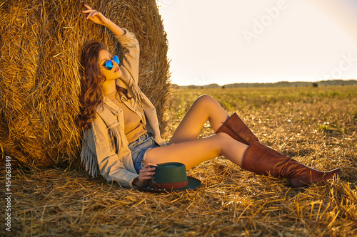 Obraz na płótnie hippie girl by a haystack