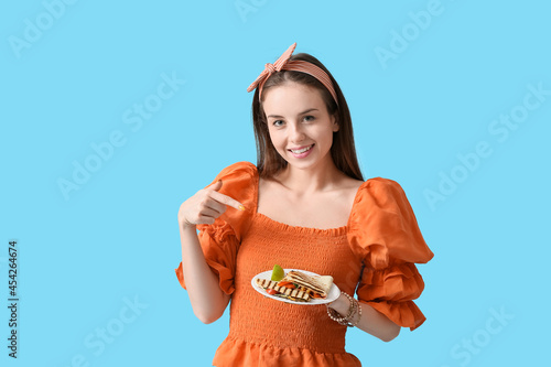 Beautiful young woman with ...