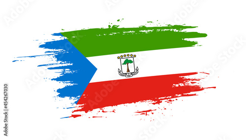 Hand drawn brush stroke flag of Equatorial Guinea. Creative national day hand painted brush illustration on white background