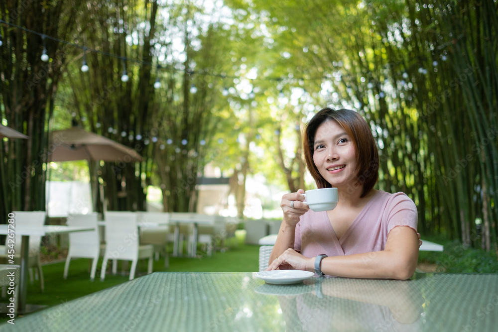 woman drinking hot coffee at morning, relax time
woman drinking hot coffee at morning, relax time