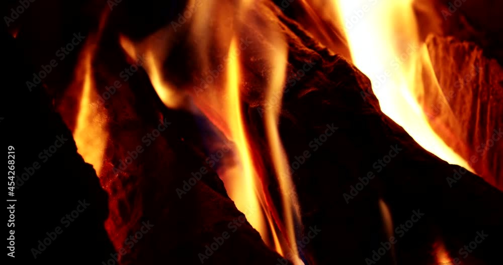Wood Burning With Fiery Flame Glowing At The Dark. - Close Up Shot Wood Burning With Fiery Flame Glowing At The Dark. - Close Up Shot