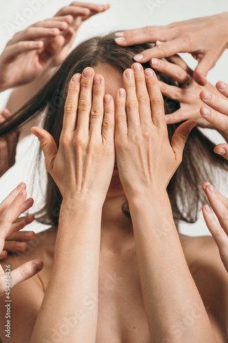 The girl closes her eyes with her hands. Female depression and disorder. Loss of vision in humans. Hand care. How to live with blindness. I don't want to see the world around me