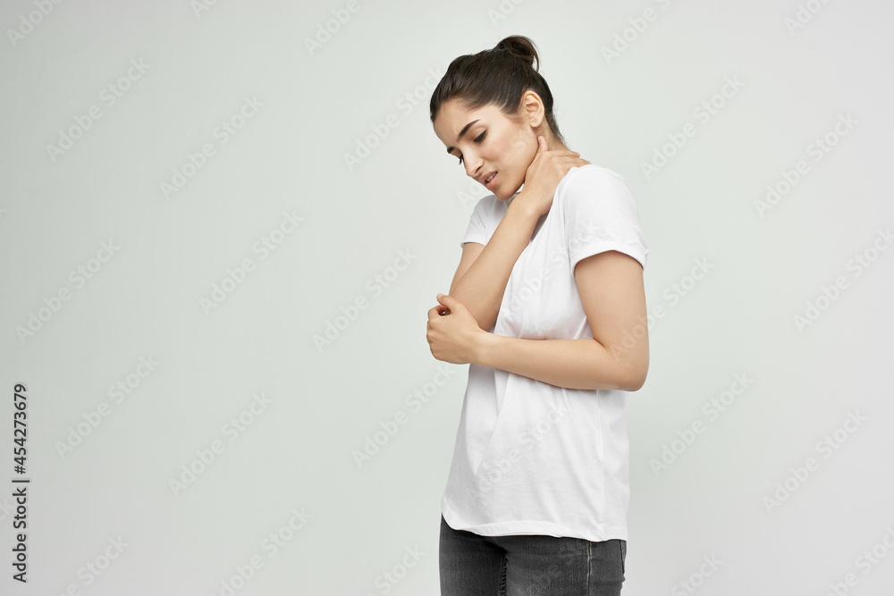woman in white t-shirt health problems medicine treatment woman in white t-shirt health problems medicine treatment