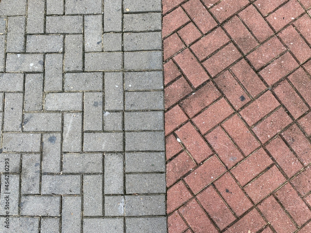 Obraz premium Grey and Brown floor bricks laid side by side.