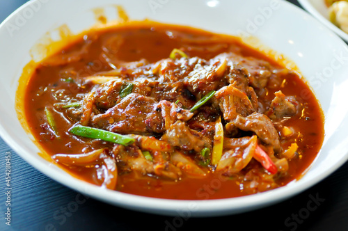 stir fried pork with red curry or stir fried beef
