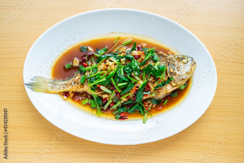 Chinese cuisine a braised yellow croaker