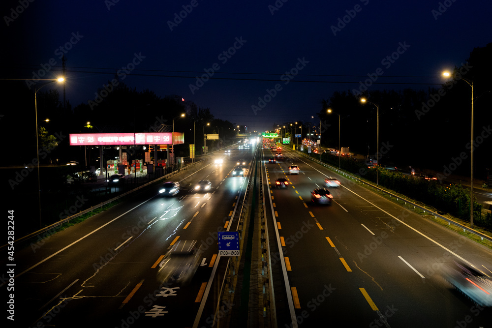 Traffic flow on roads and highways at night Traffic flow on roads and highways at night