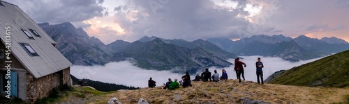hikers enjoying the scenery, Espuguettes refuge, Pyrenees National Park, Hautes-Pyrenees, France