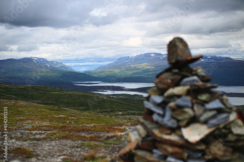 Rock cairn in front of lapland landscape