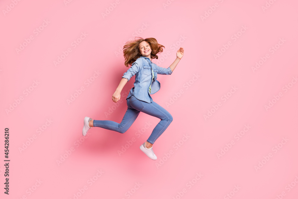 Full length body size photo jumping up running on sale girl isolated pastel pink color background
