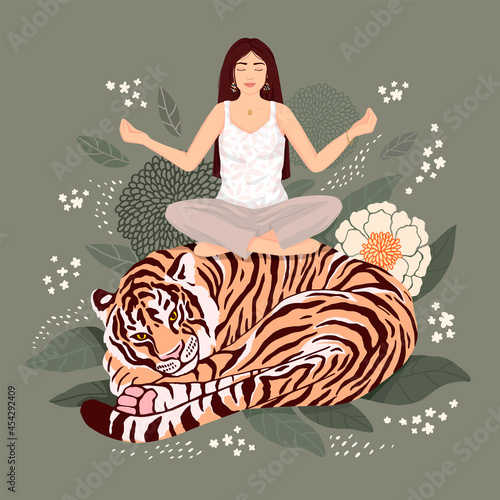 the girl practices yoga, sitting on a tiger, which lies curled up. against a background of leaves and flowers. vector modern flat illustration. for postcard, poster, book cover.