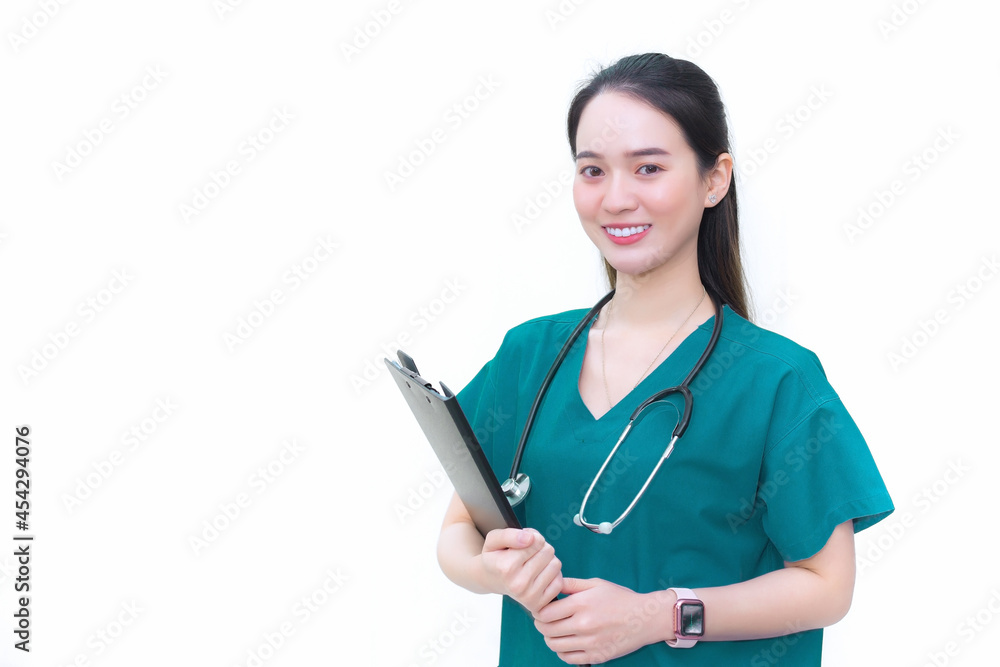 Asian professional woman doctor standing smiling in a green lab shirt, holding patient documents in hand. Health care concept Asian professional woman doctor standing smiling in a green lab shirt, holding patient documents in hand. Health care concept
