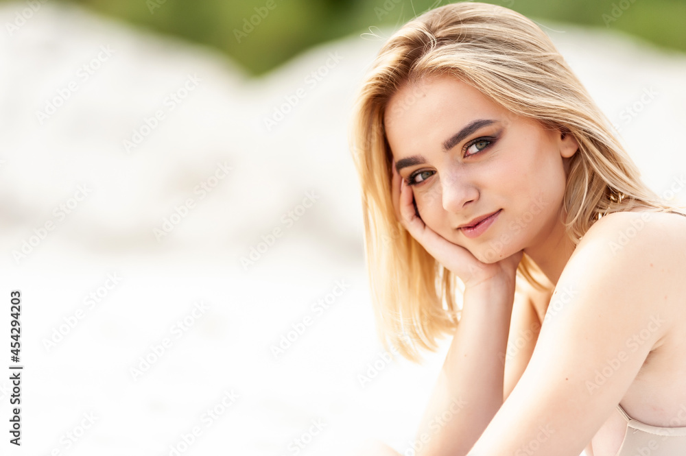 Beautiful young blonde woman sunny portrait Beautiful young blonde woman sunny portrait