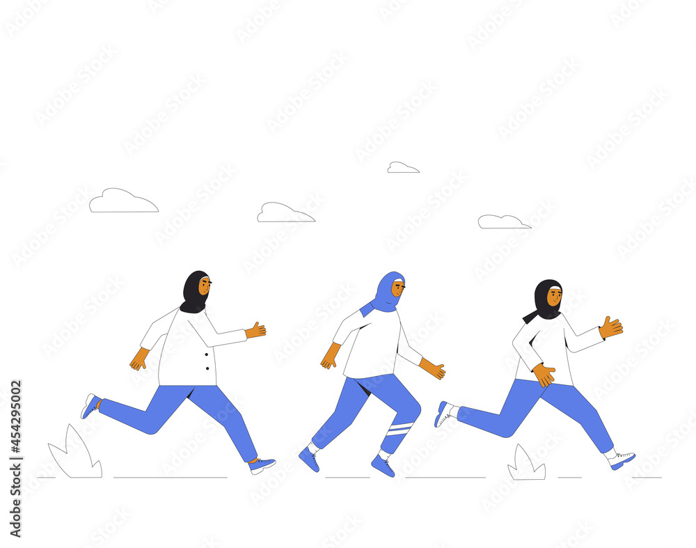 Runners. Joggers. Young women in hijab running.