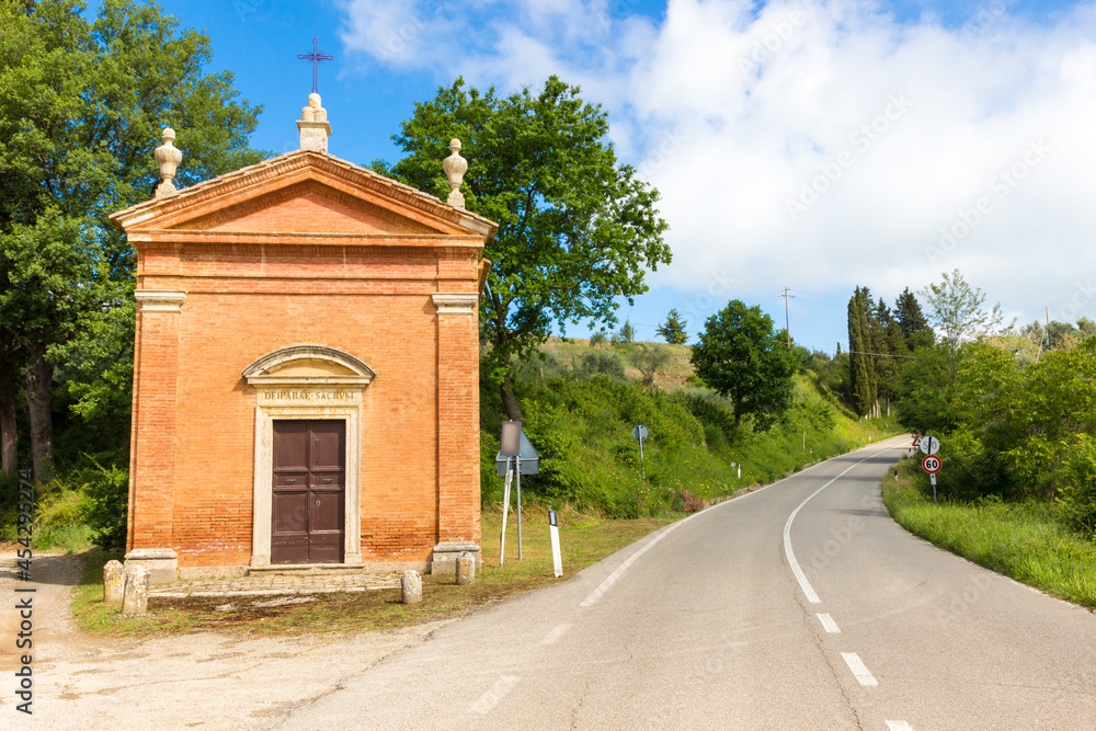 Small church in countryside in a spring day in Tuscany, Italy