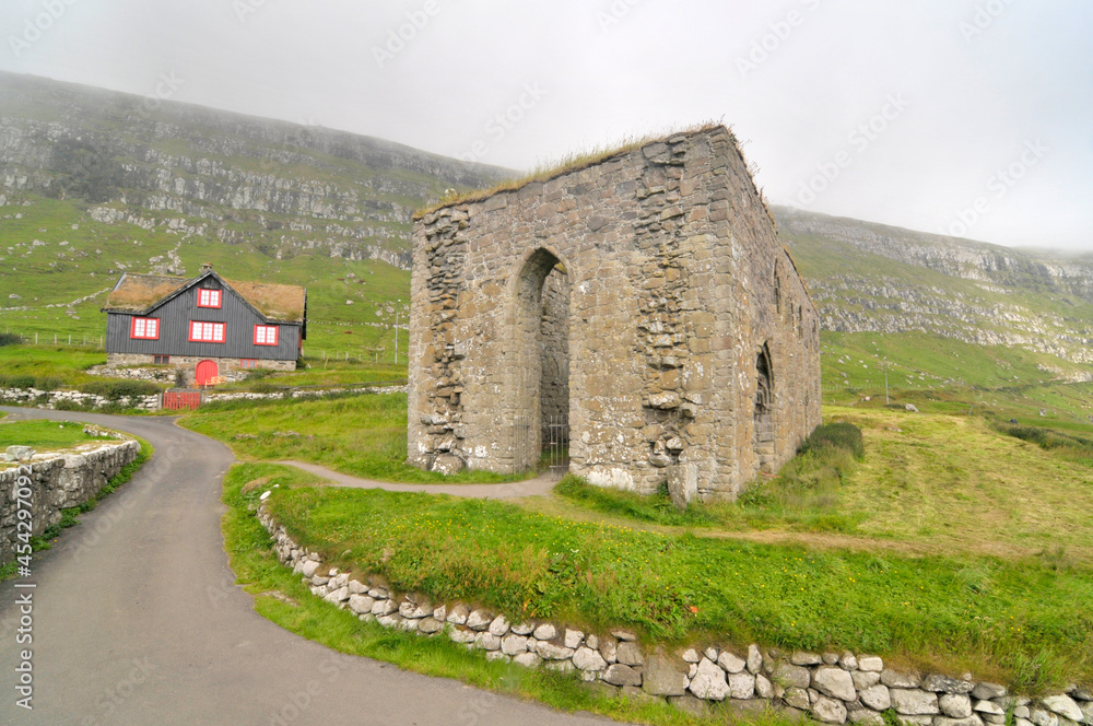 St. Magnus Cathedral -   a ruined cathedral in the village of Kirkjubøur on the island of Streymoy in the Faroe Islands