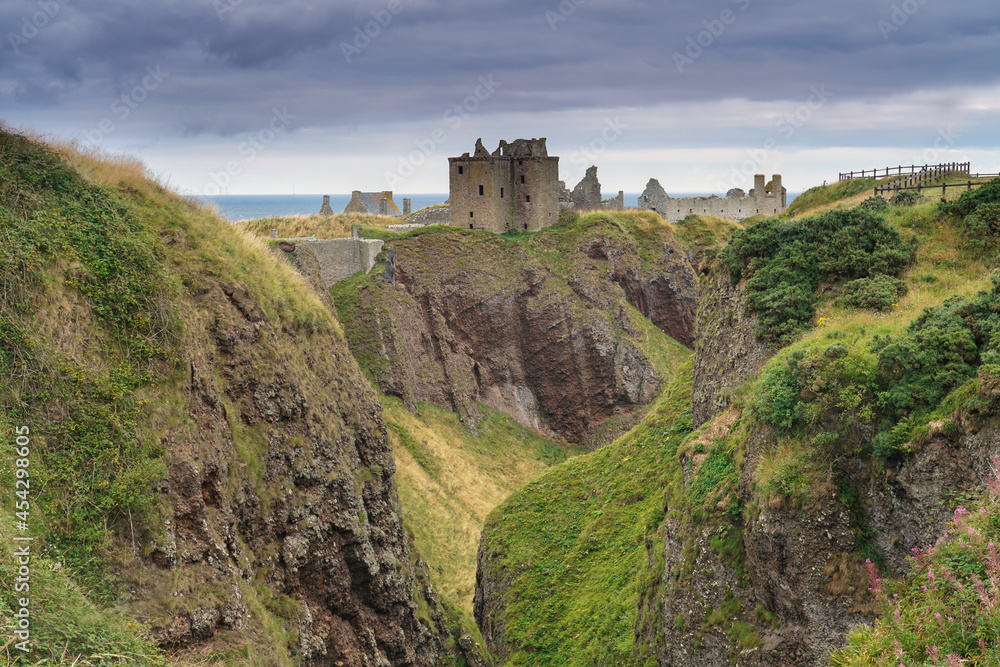 Dramatic view of Dunnotar castle located in Aberdeenshire, Scotland.