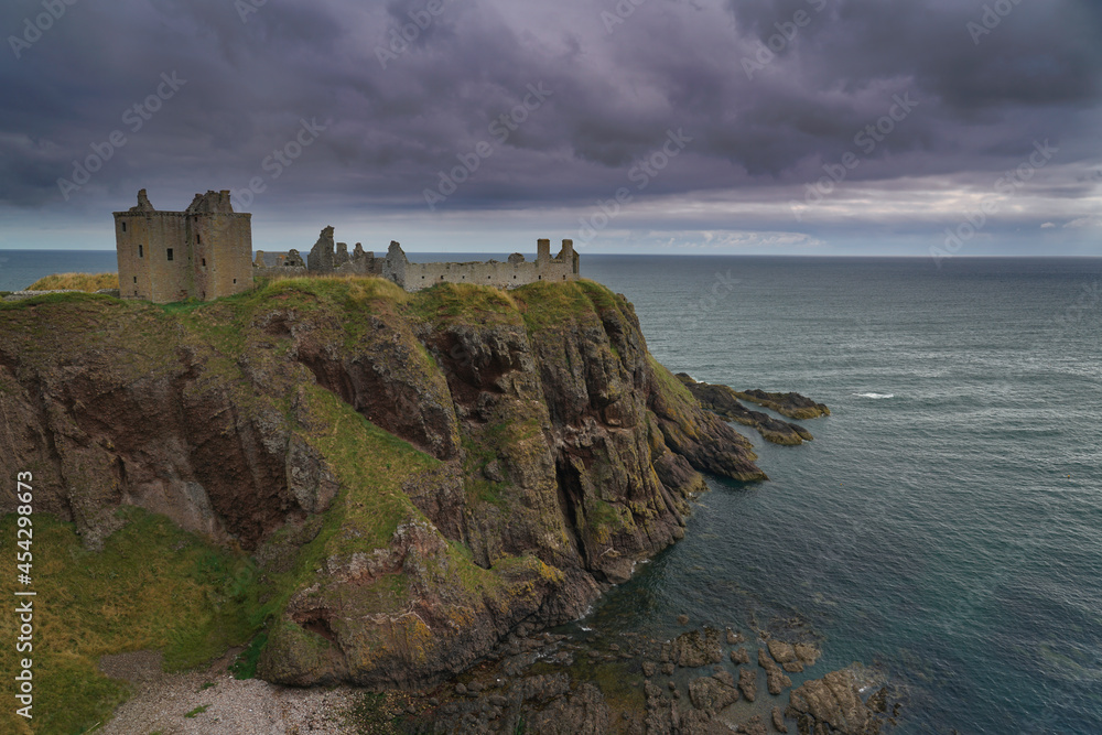Dramatic view of Dunnotar castle located in Aberdeenshire, Scotland.