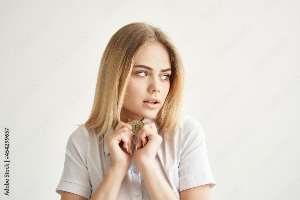 cheerful woman Bitcoin cryptocurrency in hands isolated background cheerful woman Bitcoin cryptocurrency in hands isolated background