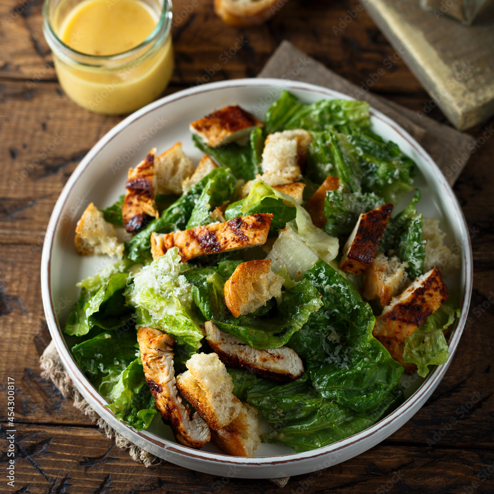 Traditional Caesar salad with grilled chicken Traditional Caesar salad with grilled chicken