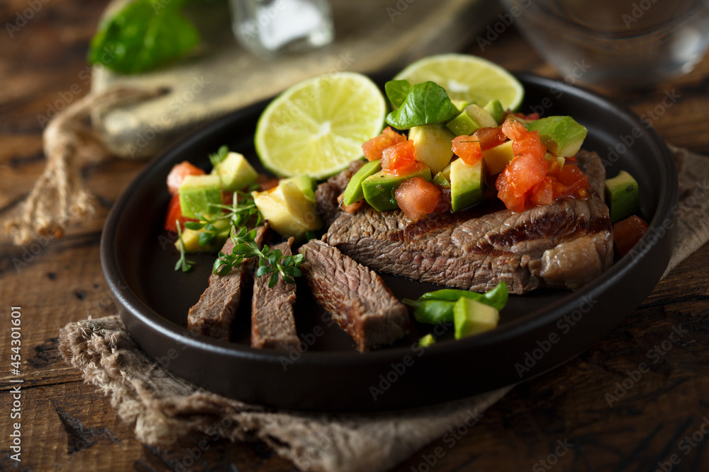 Grilled beef steak with avocado salsa Grilled beef steak with avocado salsa