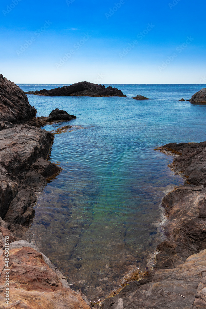 rocky coast a sunny summer day in cap de creus in northern spain