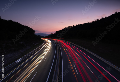 Car lights on the A8 highway as it passes through Donostia-San Sebastian, Euskadi