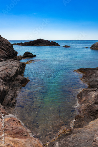 rocky coast a sunny summer day in cap de creus in northern spain © larrui