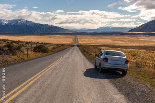 Highway theme picture. Highway concept picture. Amazing autumn. The natural landscape of the Patagonian plateau. Travel in Chile in South America.