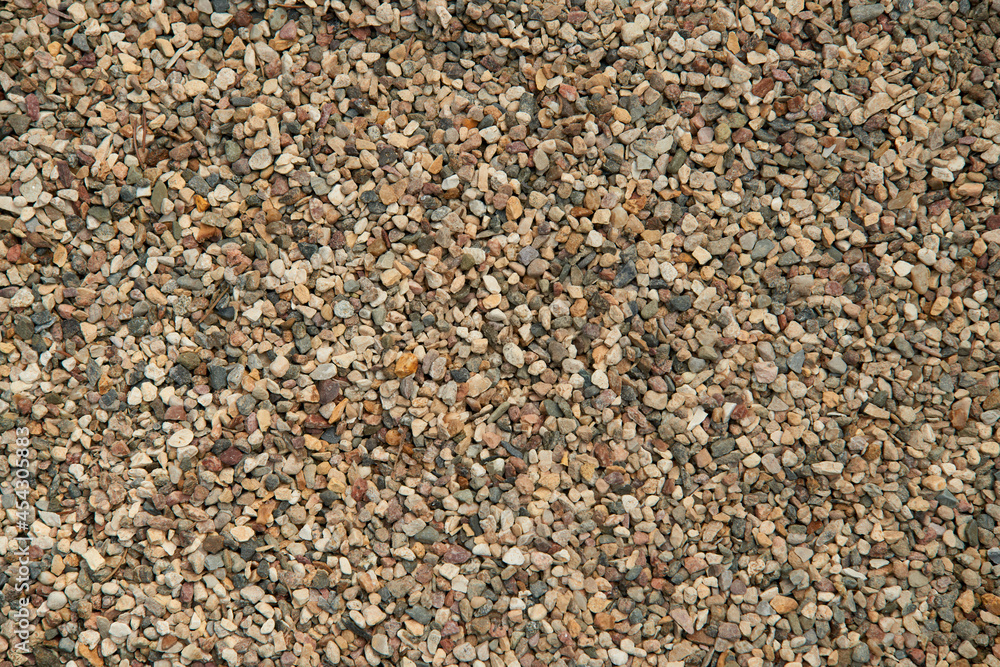 Natural colorful pebble stones background texture with copy space. Natural colorful pebble stones background texture with copy space.