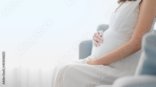 Schilderij op canvas お腹をさする妊婦　イメージ