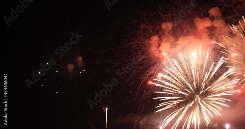 Red Firework celebrate anniversary happy new year 2022  4th of july holiday festival. red firework in night time celebrate national holiday. Countdown to new year 2022 festival party time event