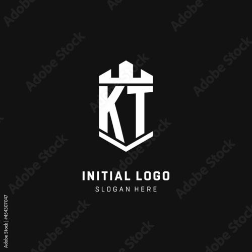 KT monogram logo initial with crown and shield guard shape style