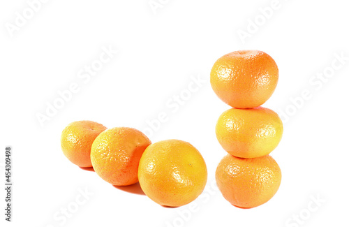 Stack and Row of Mandarin Oranges Isolated on White Backdrop