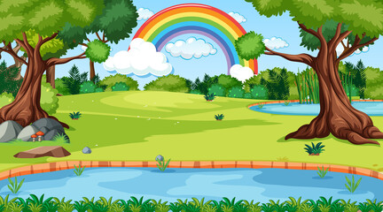 Ingelijste posters Regenboog Regenboog boven groene heuvels en bomen  © blueringmedia