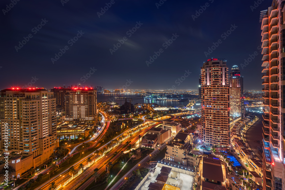 Beautiful aerial night view of Pearl Qatar Porto Arabia Artificial Island