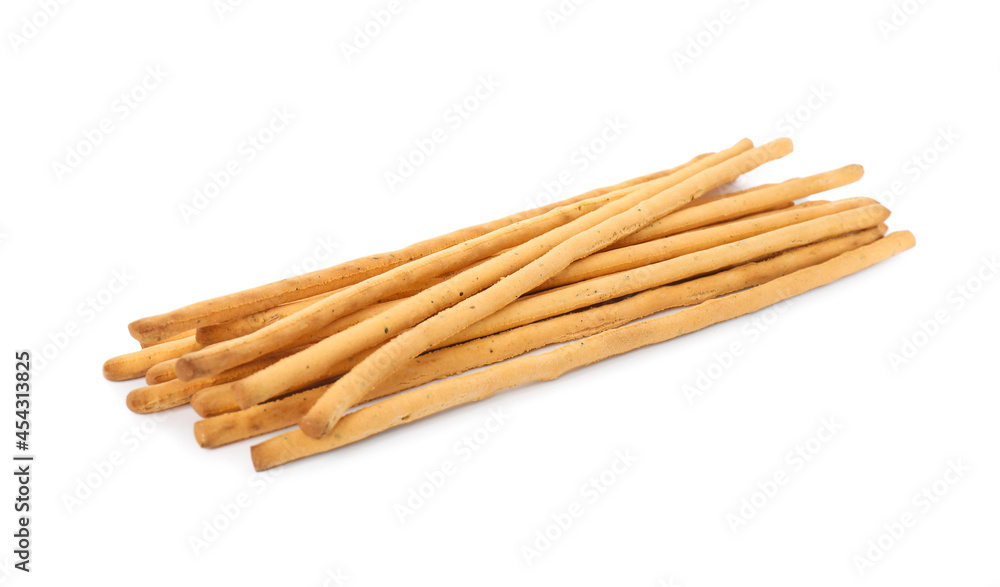 Fresh delicious grissini sticks on white background