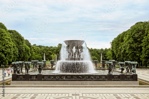 green plants with water fountain ta Frogner Park in Oslo, Norway