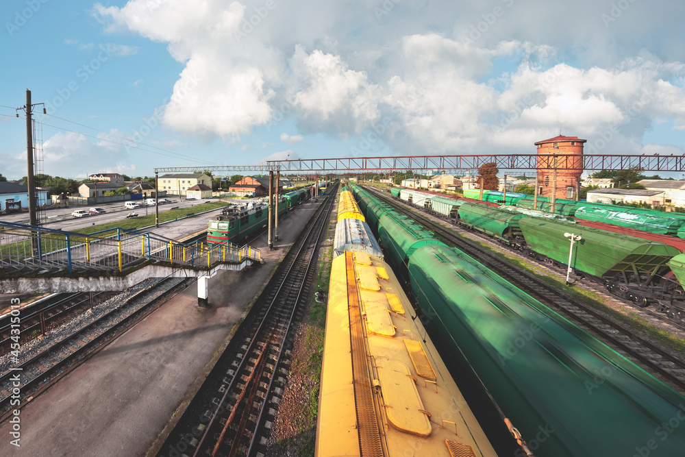 Freight trains - Cargo transportation. Grain transportation. Junction station from above Freight trains - Cargo transportation. Grain transportation. Junction station from above